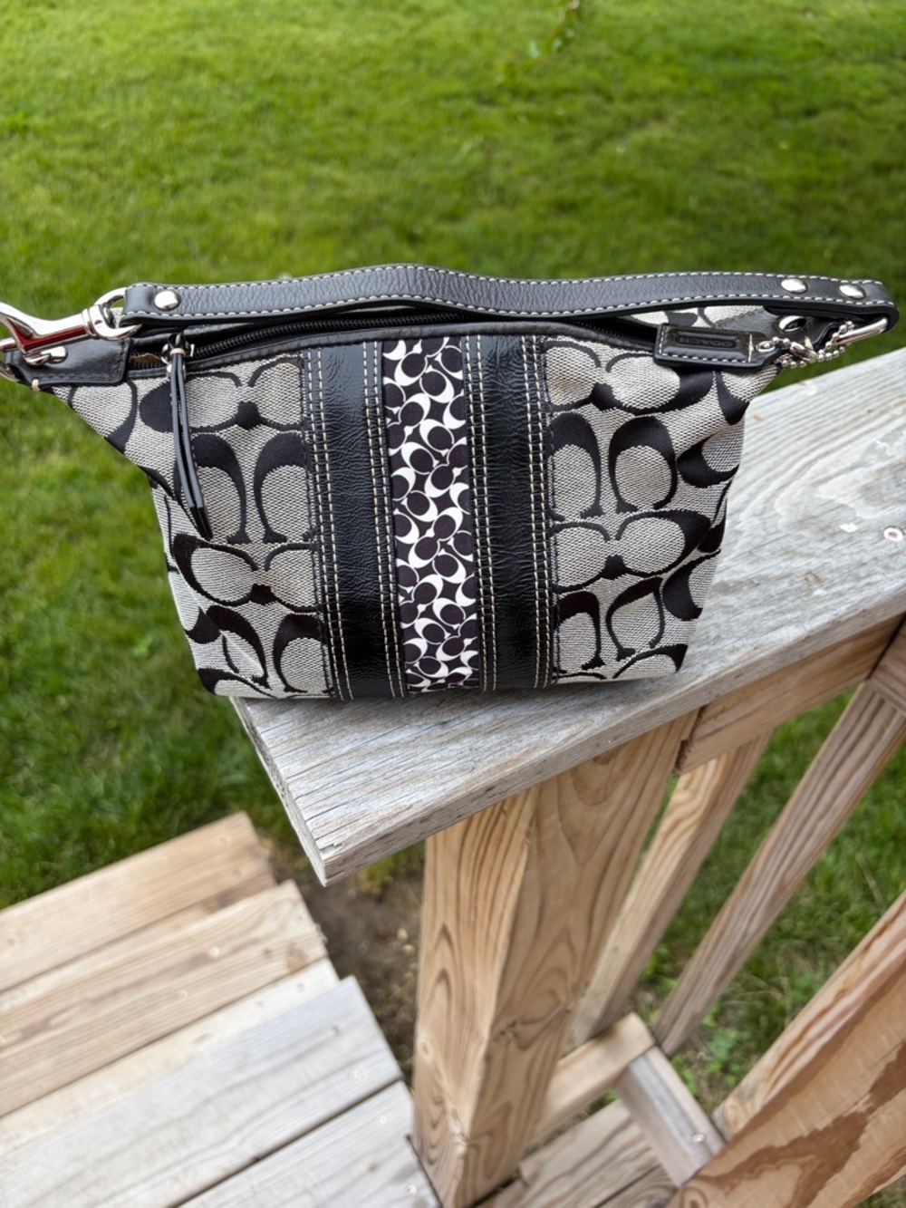 Coach signature stripe mini bag and black and white.